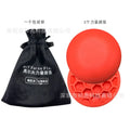 Orange golf training mat with red accents on natural rubber surface for centre of gravity practice