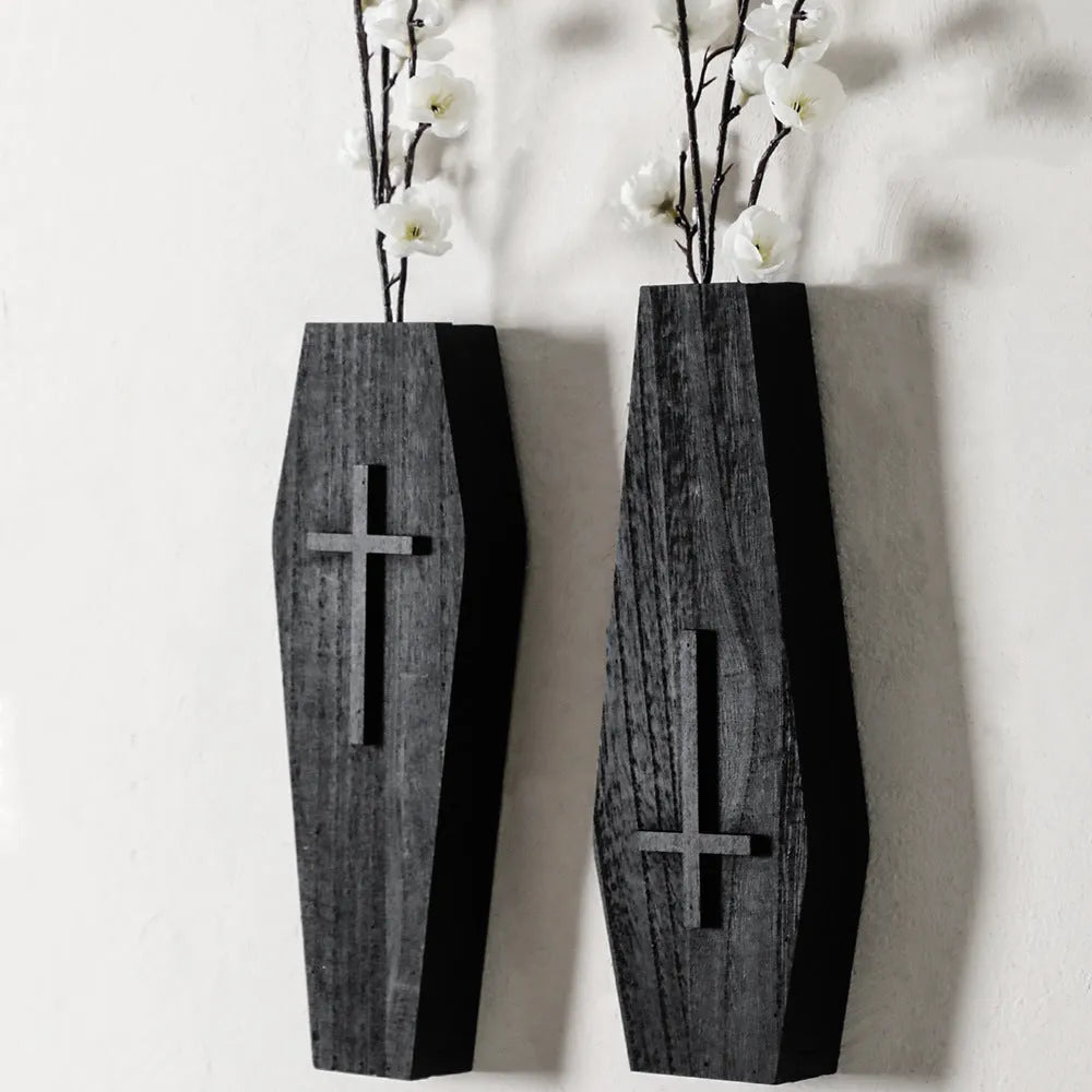 Black wooden cross-shaped wall shelf decoration measuring 27cm by 9cm