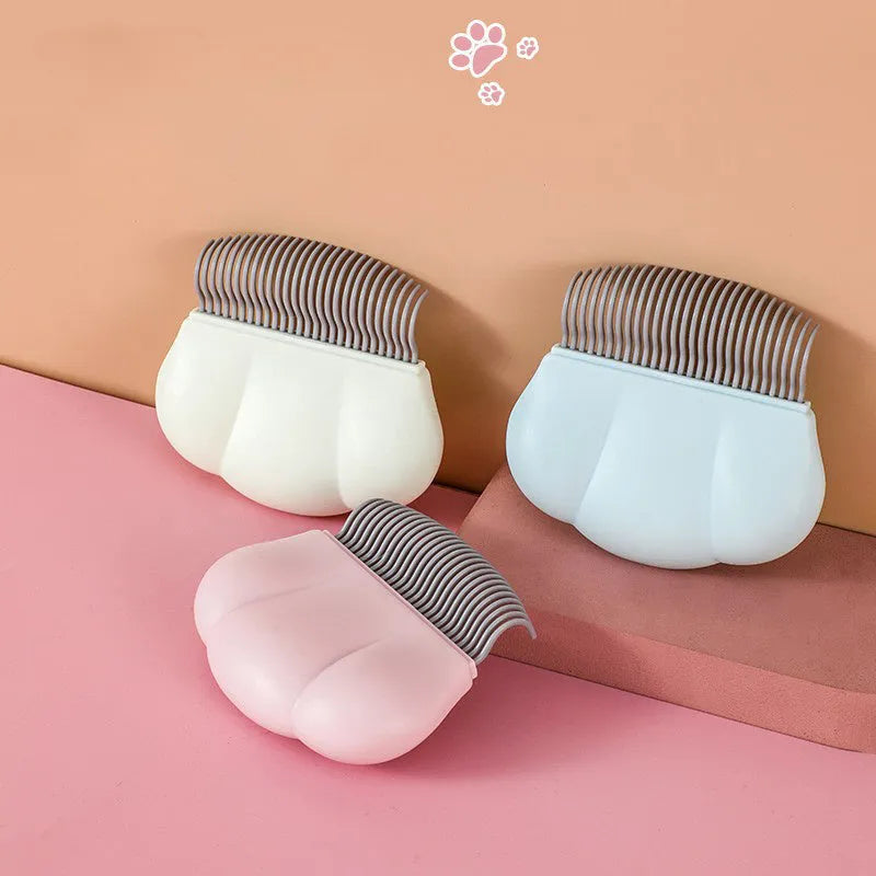 Paw Soft deshedding brush for cats and dogs in blue pink or white colours