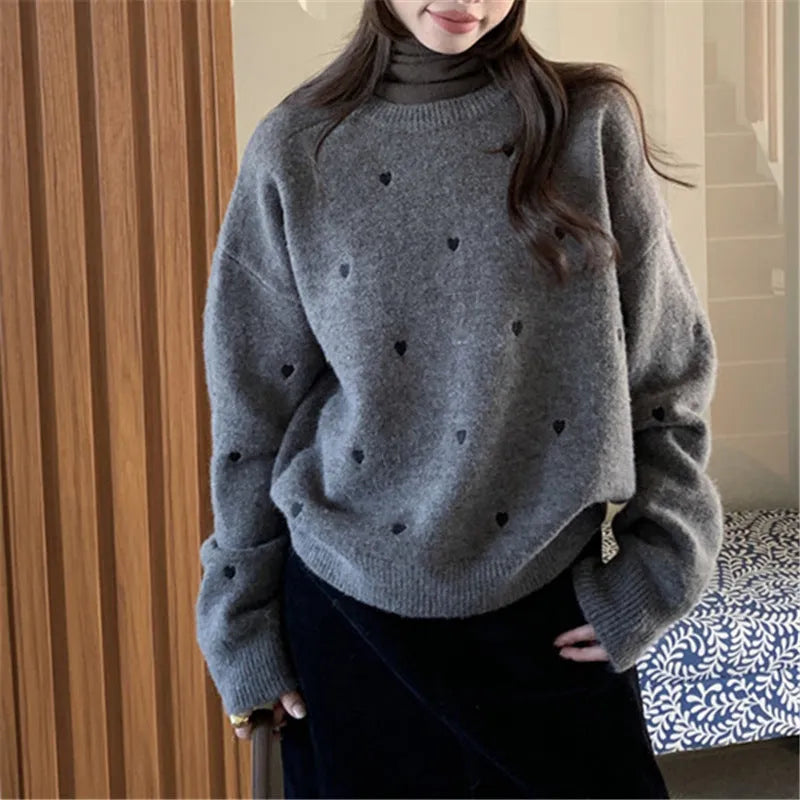 Women's loose fit long sleeve acrylic pullover sweater with love embroidery in milky white.