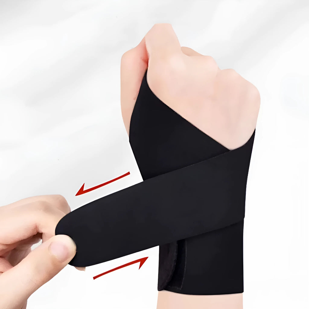 Adjustable black athletic wristguard shown fastened on a wrist.
