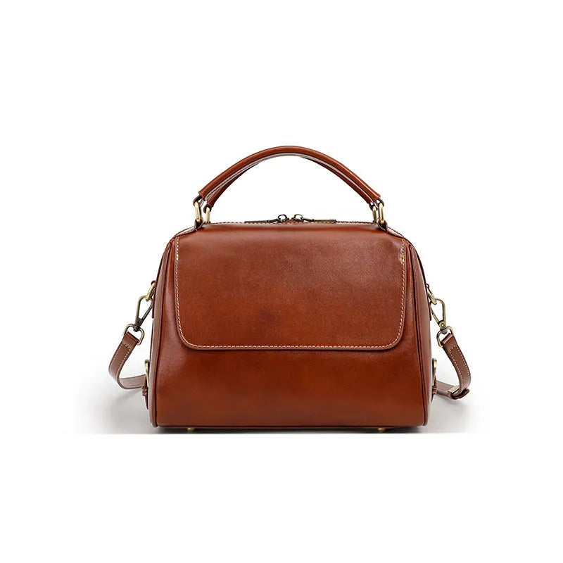 Genuine leather crossbody tote bag in a cross square shape with double straps and internal organiser pockets.