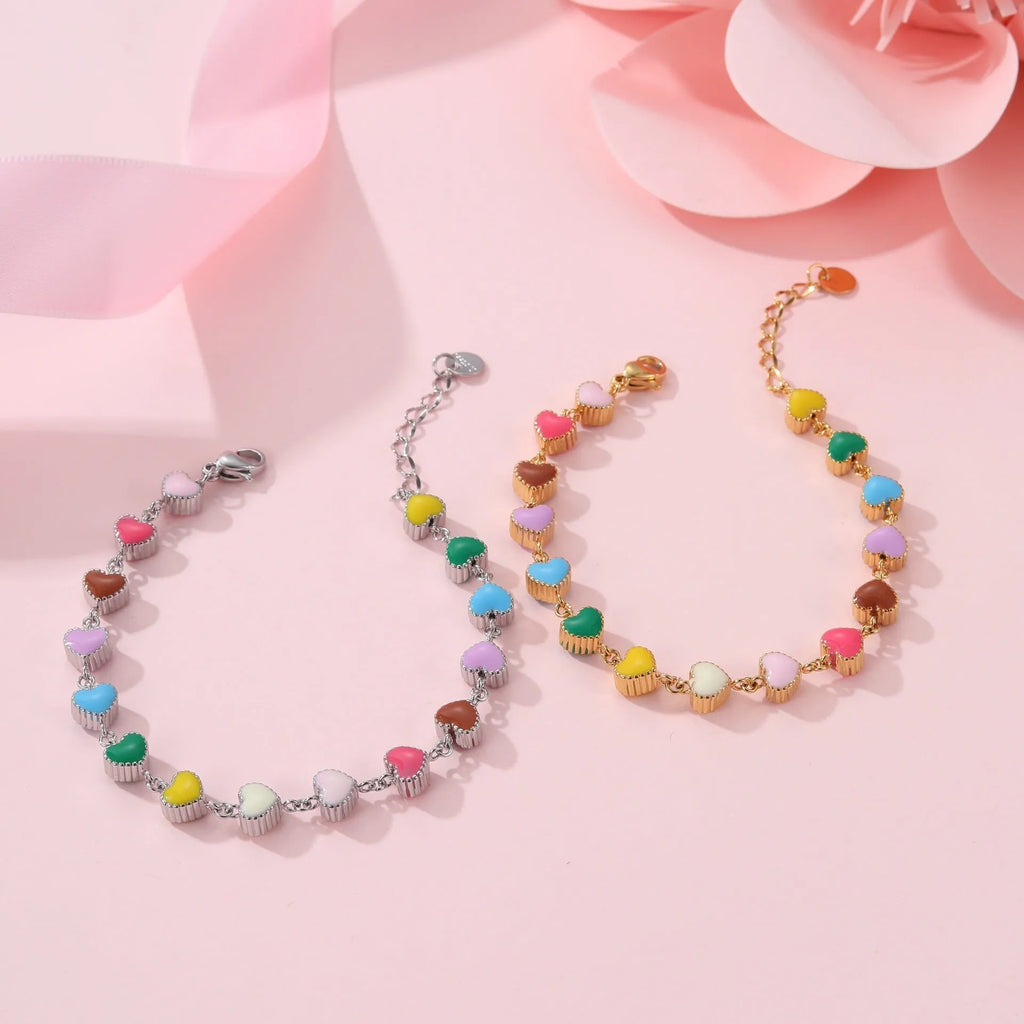 Heart-shaped titanium steel bracelet with colourful oil elements in gold or steel colour options