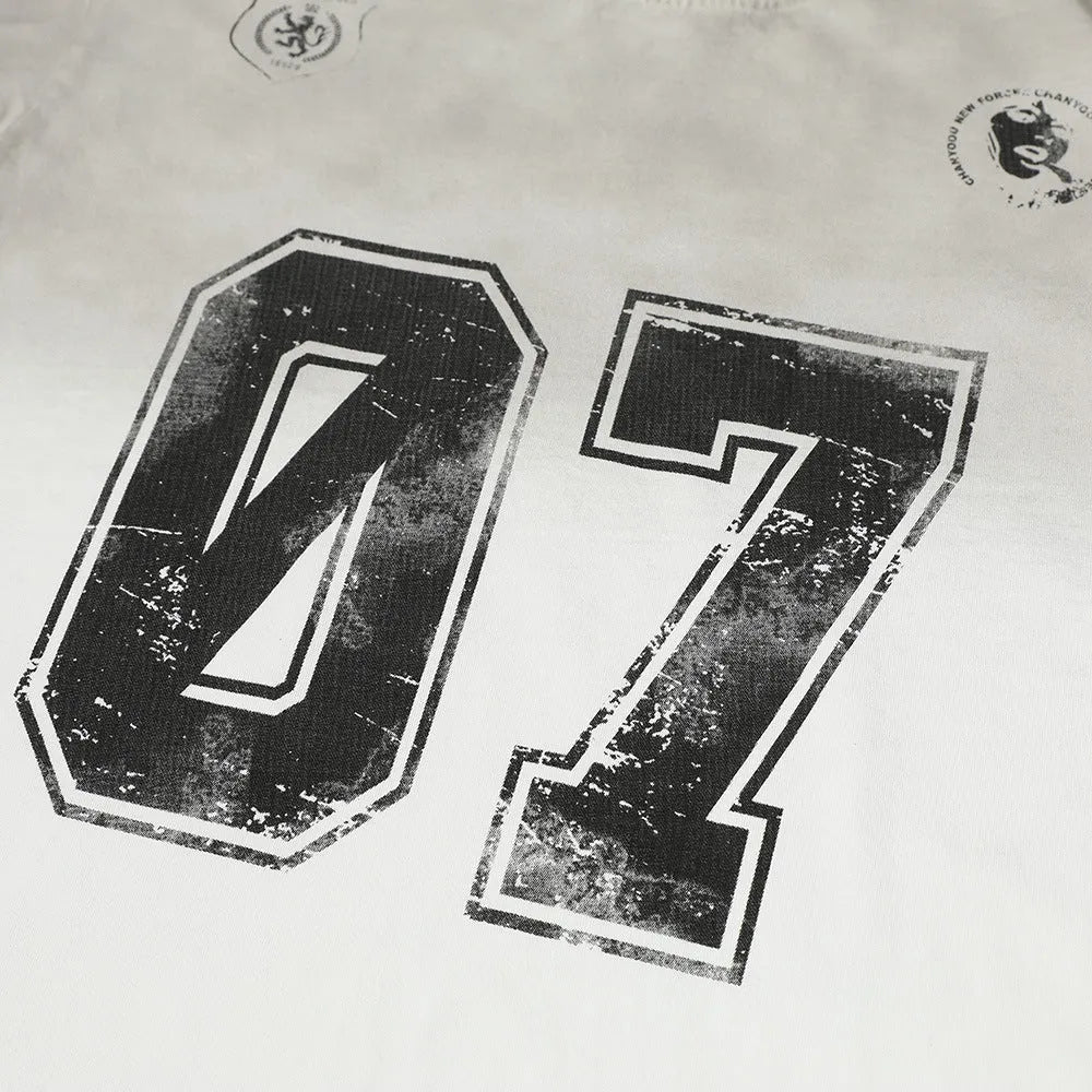 Man wearing a black printed cotton short-sleeved t-shirt, showing front design.