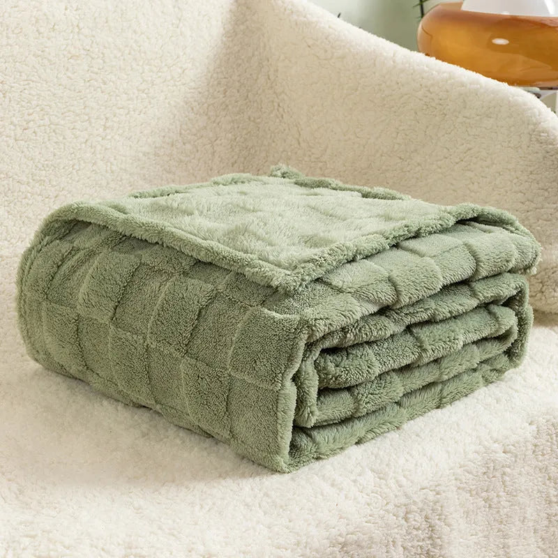 Geometric patterned polyester blanket in milky white showing cotton velvet texture and thickened construction