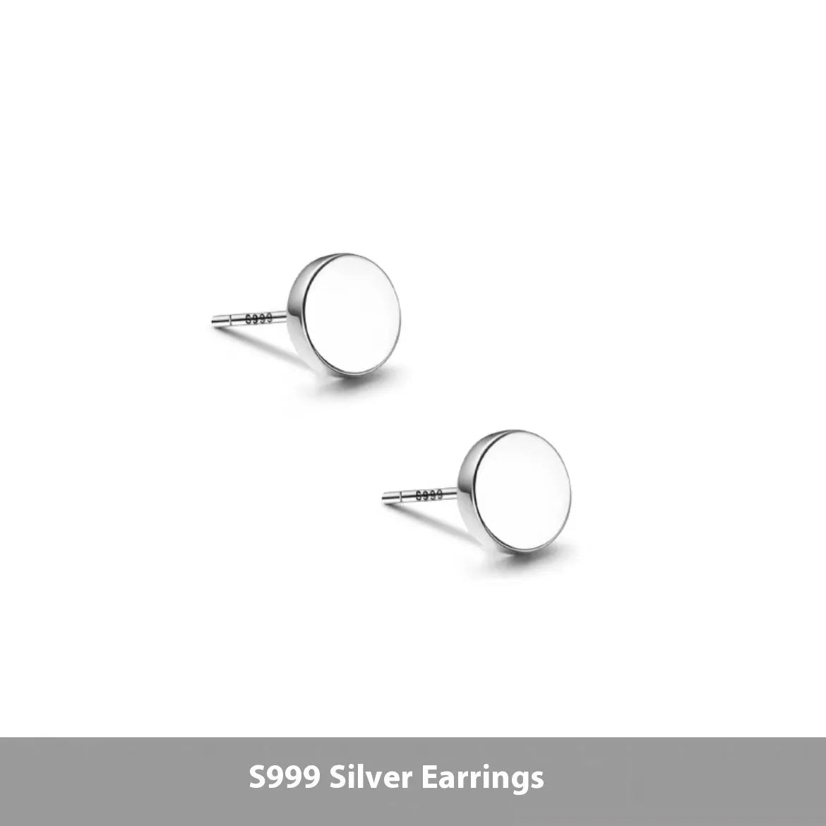 A pair of simple, round, flat-fronted S999 sterling silver ear bone studs on a plain background.