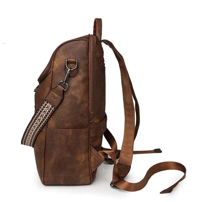 Retro style PU leather college backpack with curved shoulder straps, shown in one of six colour options.