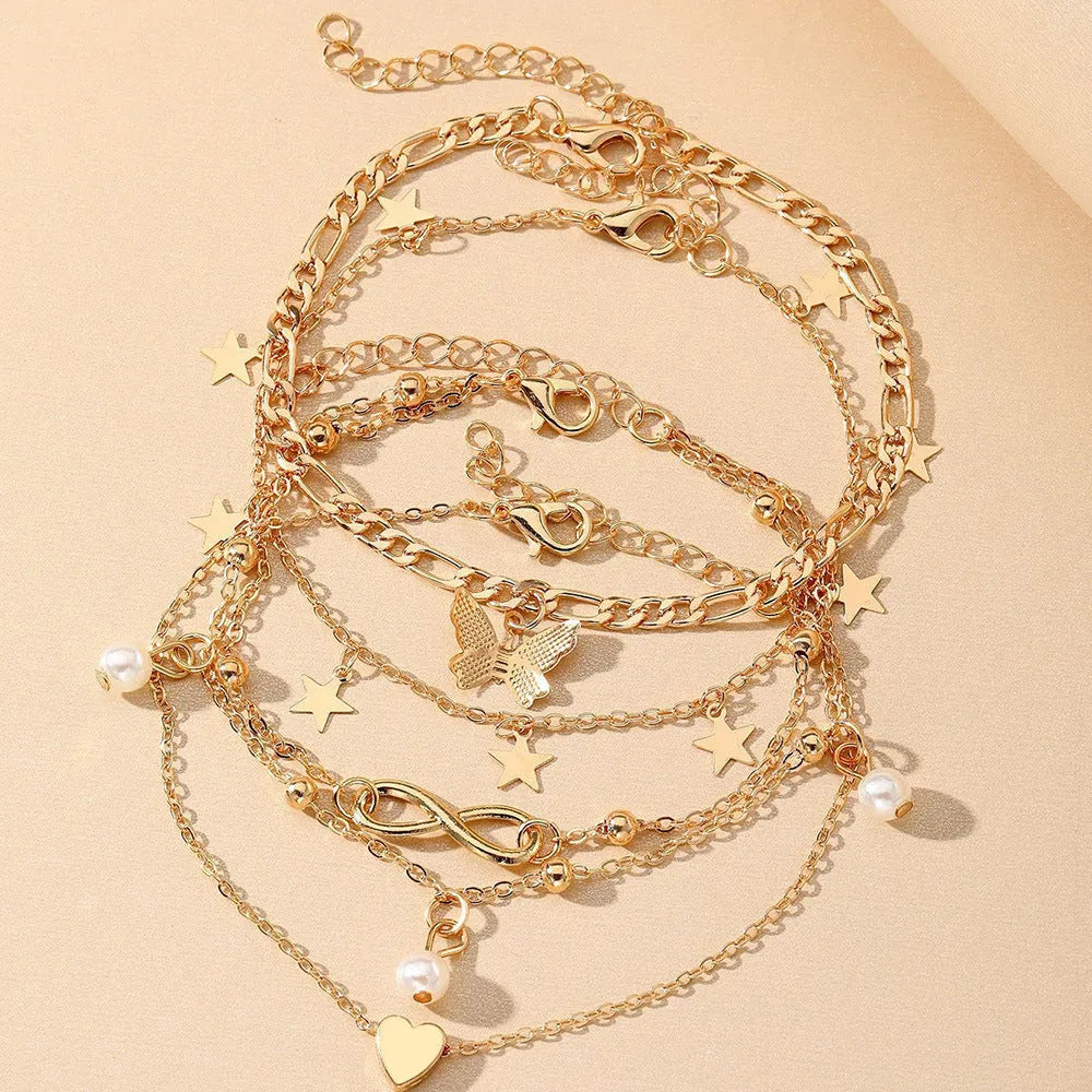 Butterfly pearl heart anklet jewellery set with four coordinated alloy foot chains