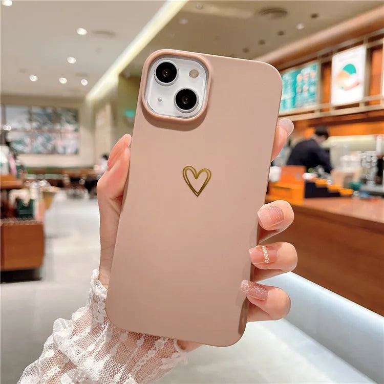 Brown silicone iPhone case with a hot-stamped love heart design on the back