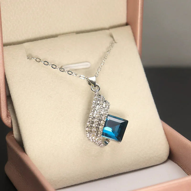 Ladies necklace and earring set with alloy pendant on cross chain, glass accents, electroplated finish