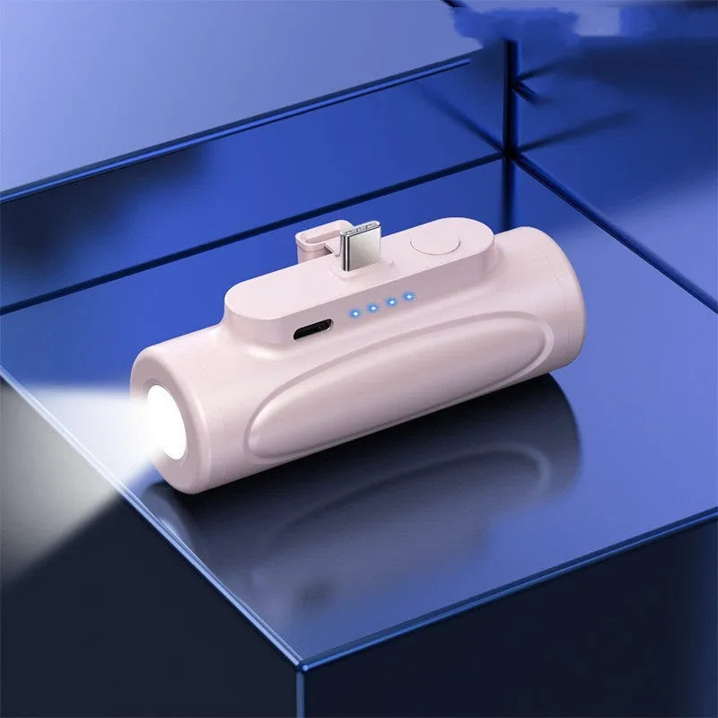 Black creative power bank with LED flashlight showing Type-C charging port and compact 83mm size