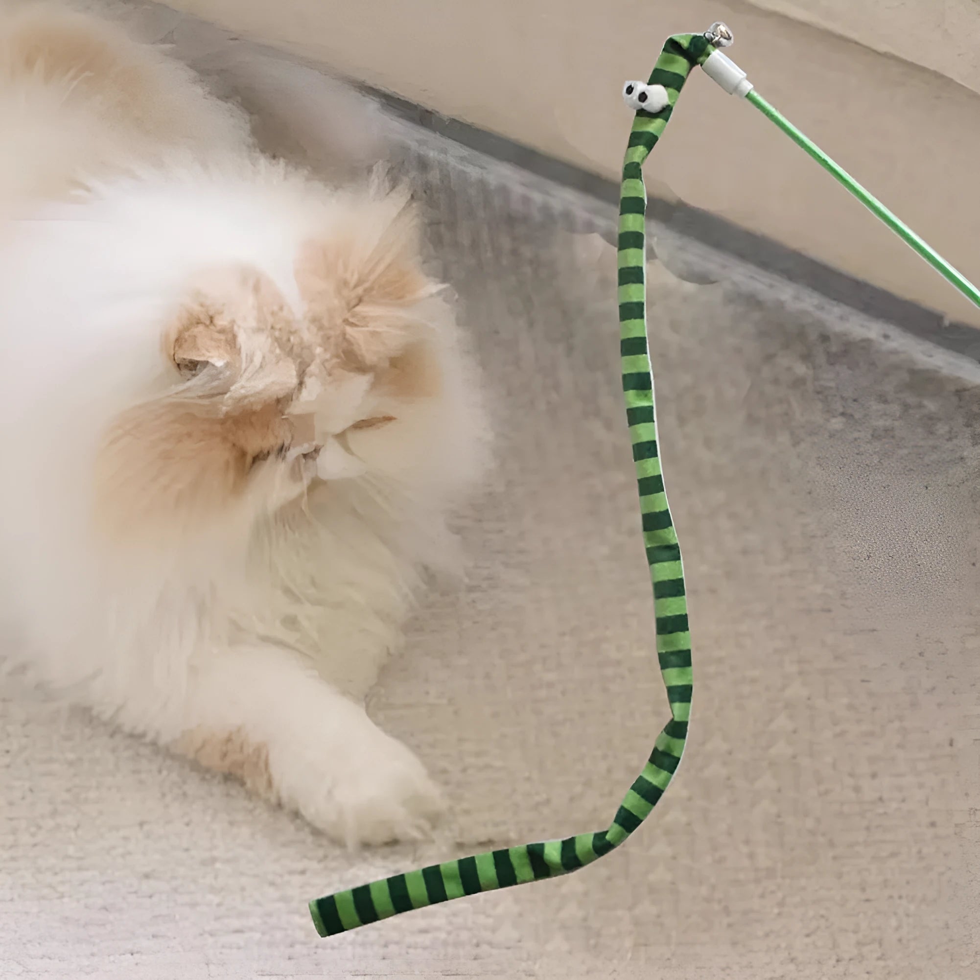 Colourful cat wand toy with polycarbonate handle and long plush strip for interactive feline play