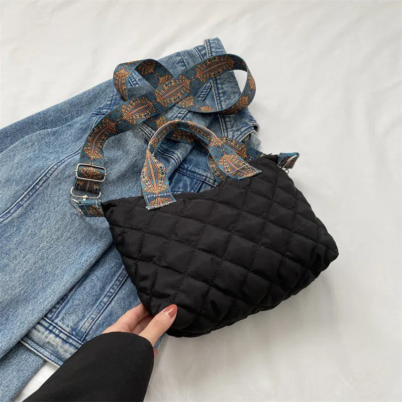 Soft Oxford cloth messenger bag with embroidery details and internal phone pocket in horizontal square shape