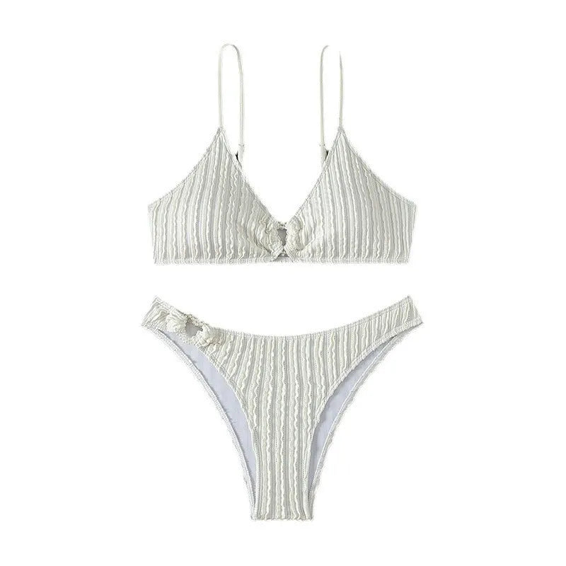 White women's V-neck swimsuit set with matching shorts for swimming