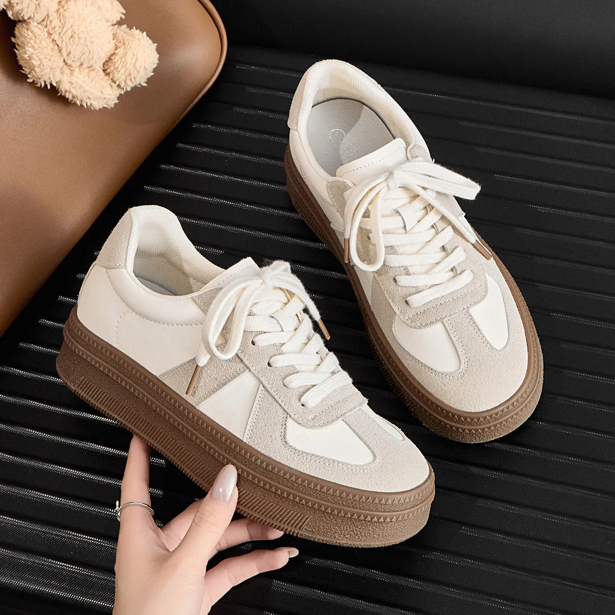 Retro board shoes with cross shoulder straps and matte upper in milky white colour