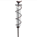 Cast iron bird garden rain gauge with glass measuring tube showing hummingbird design