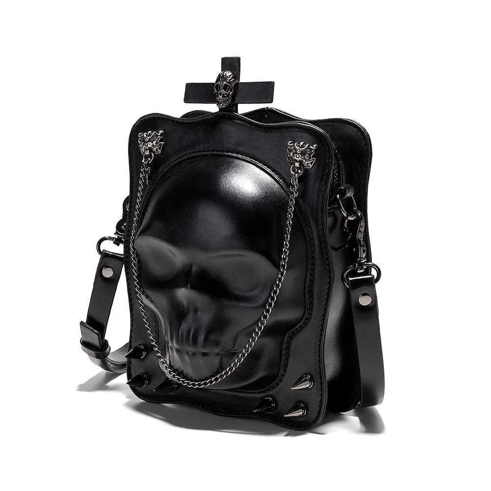 Black mini square crossbody bag with 3D embossed skull design and chain strap