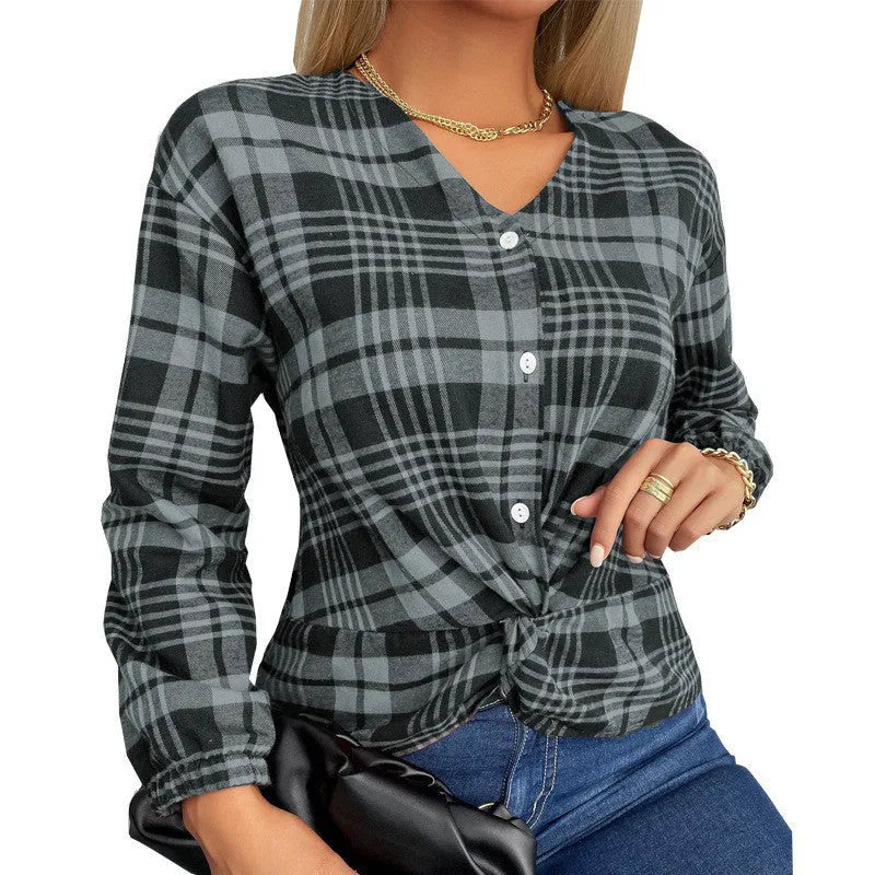 Women's purple, grey, and red plaid casual shirt with regular sleeves on a hanger.
