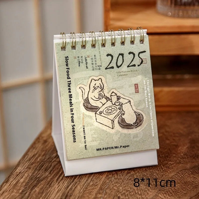 Mini coffee-themed desk calendar for 2025 showing daily pages and simple modern design