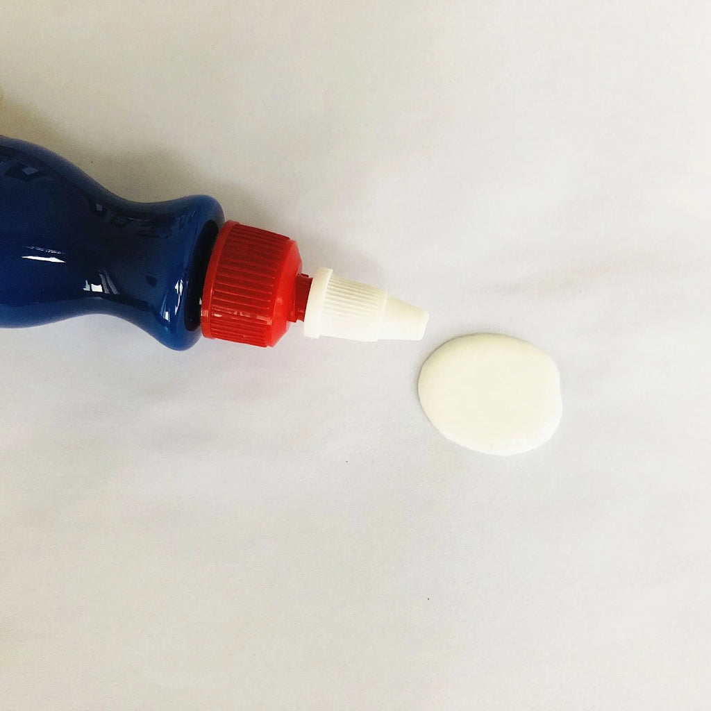 Small blue car wiping tool kit with scratch repair agent bottle and applicator sponge.
