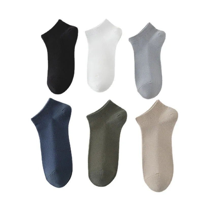Solid colour low-cut polyester boat socks for men, shown in one of six available colour variants.
