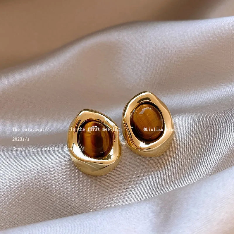Three pairs of handmade geometric alloy earrings with electroplated finish and tassel elements