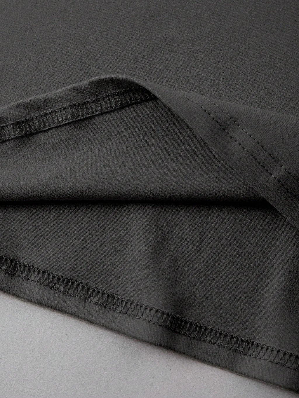 A straight-cut cotton T-shirt with short sleeves and a round neck, shown in one of the available colours.