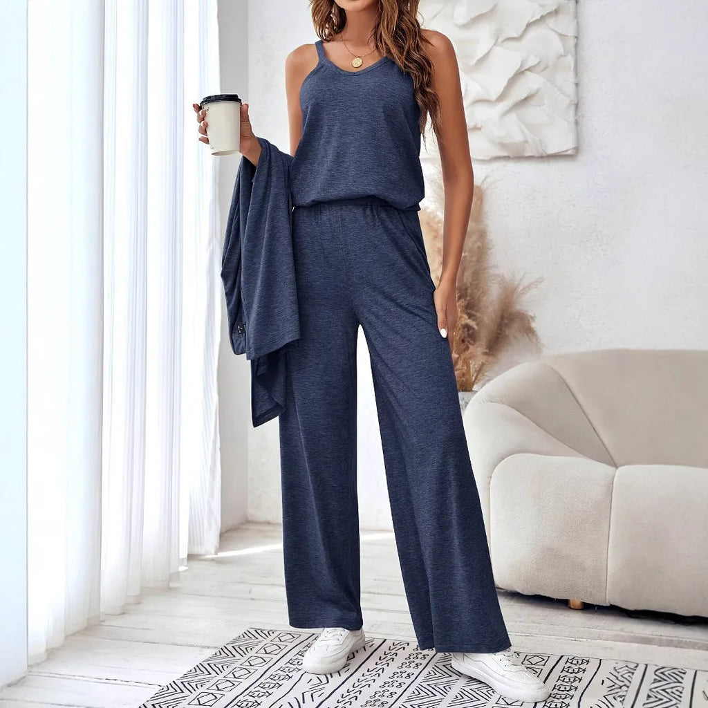 Blue women's three-piece casual suit set featuring trousers, a long-sleeve top, and suspenders on a hanger.