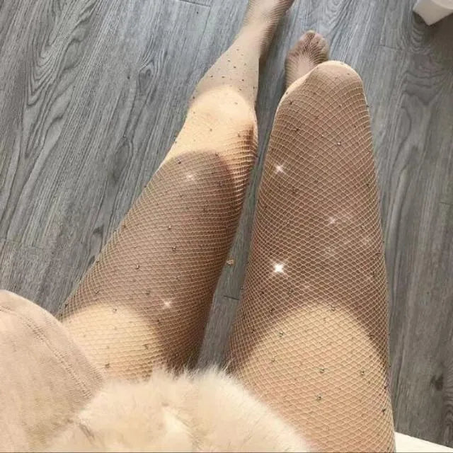 Women's mesh fishnet stockings with diamond pattern in black, white, and skin colour.