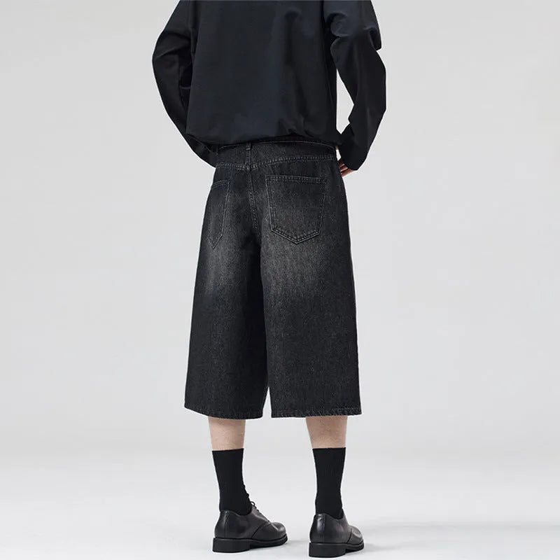 Men's light blue denim shorts with a straight leg and cropped length on a mannequin.