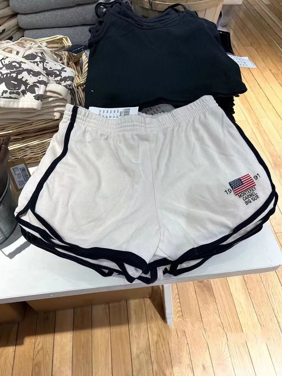 Women's dark blue cotton sports shorts with white flag embroidery design