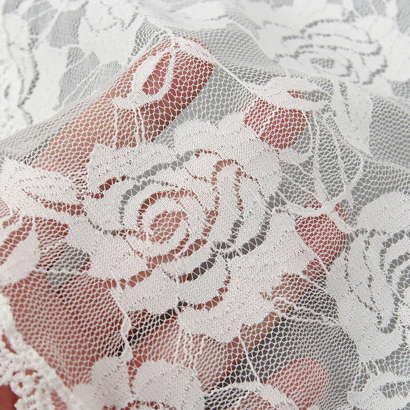 Round 30cm bridal head covering accessory in polyester with floral decoration
