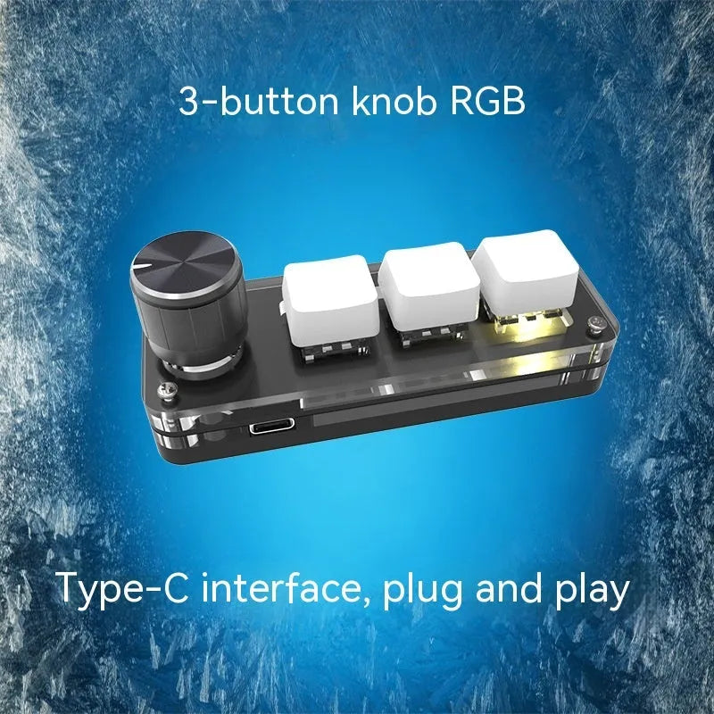 Black custom mechanical keypad with RGB backlighting and dedicated copy paste keys on desk