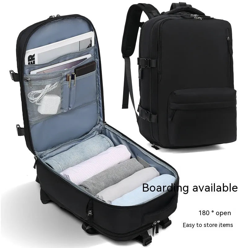 Large black waterproof nylon mummy backpack with zipped compartments.