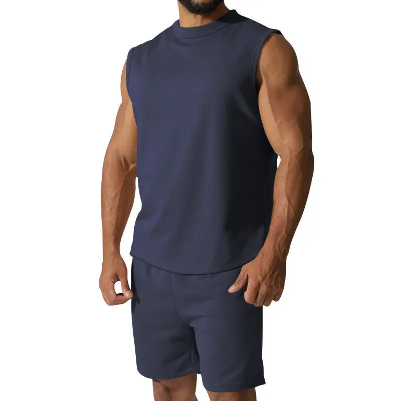 Men's sleeveless cotton blend sports top and matching shorts in a solid colour