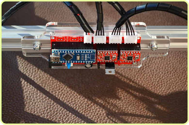 Miniature laser engraving machine with 3000mW output and 400x300mm base dimensions