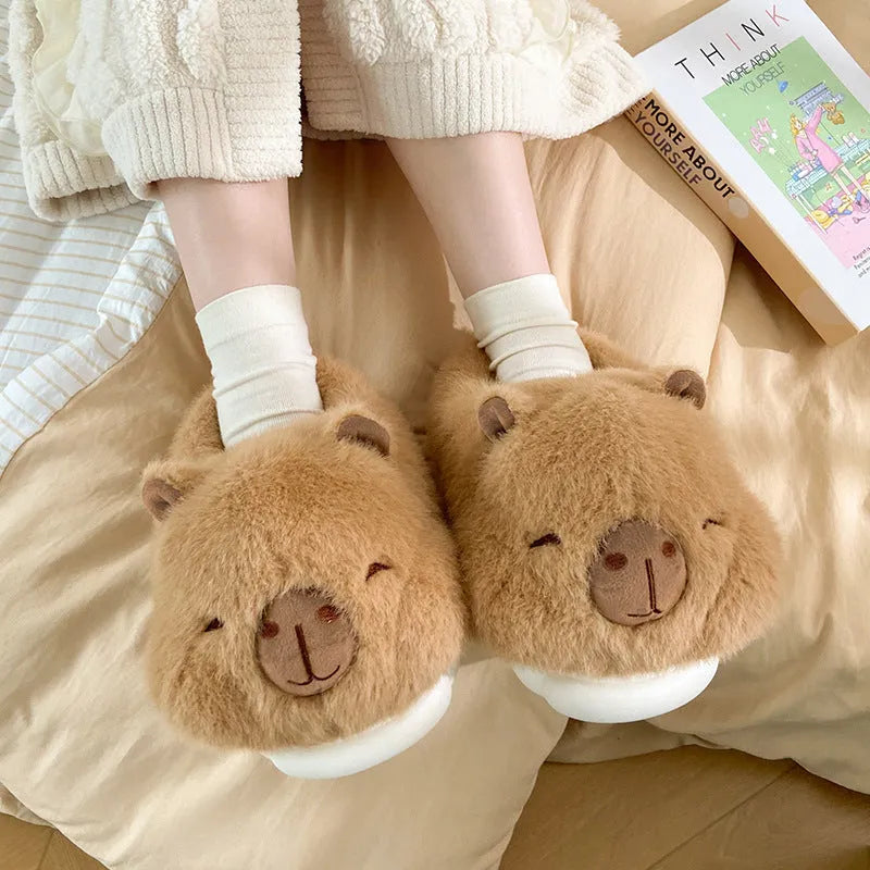 Light brown women's winter slippers with plush upper and oversleeve design