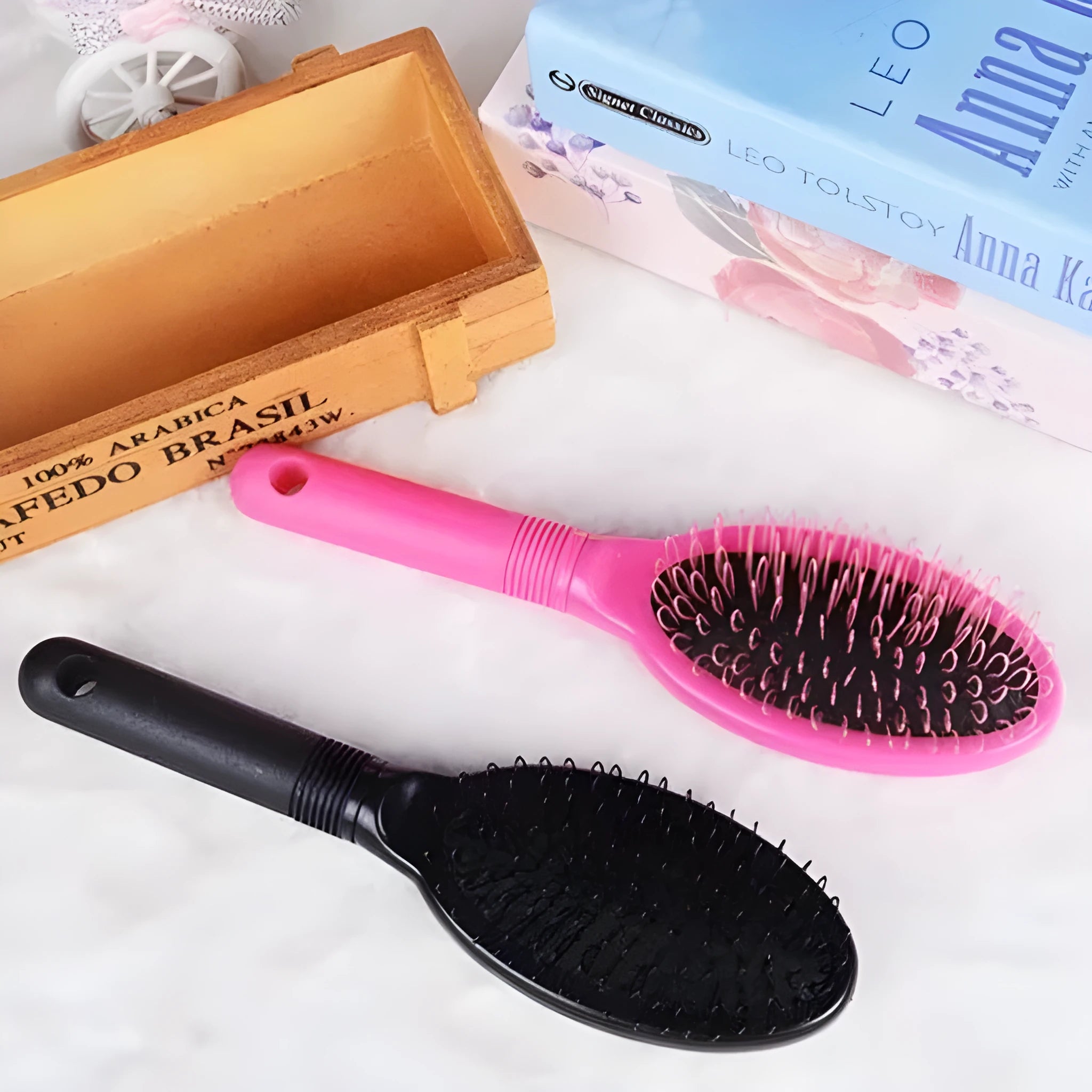 Black and pink plastic hairdressing comb with ring teeth for hair extension application