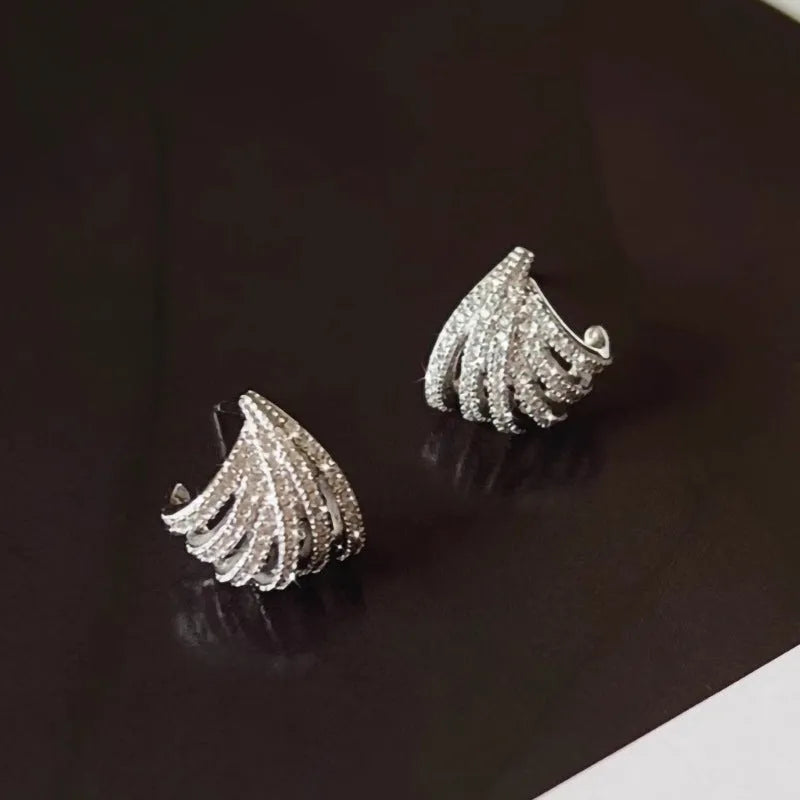 Women's geometric line design earrings with zircon detailing and platinum electroplated finish