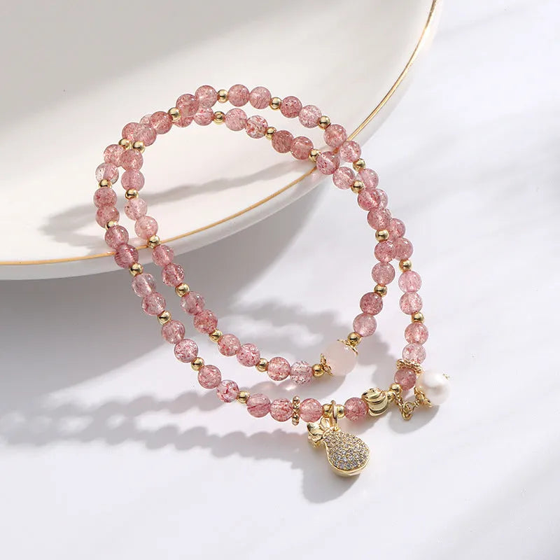 Geometric strawberry quartz crystal bracelet for women with money drawing association