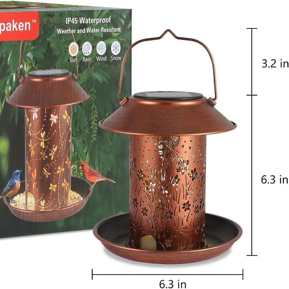 Solar-powered iron art bird feeder lamp with hummingbird pattern for outdoor gardens.