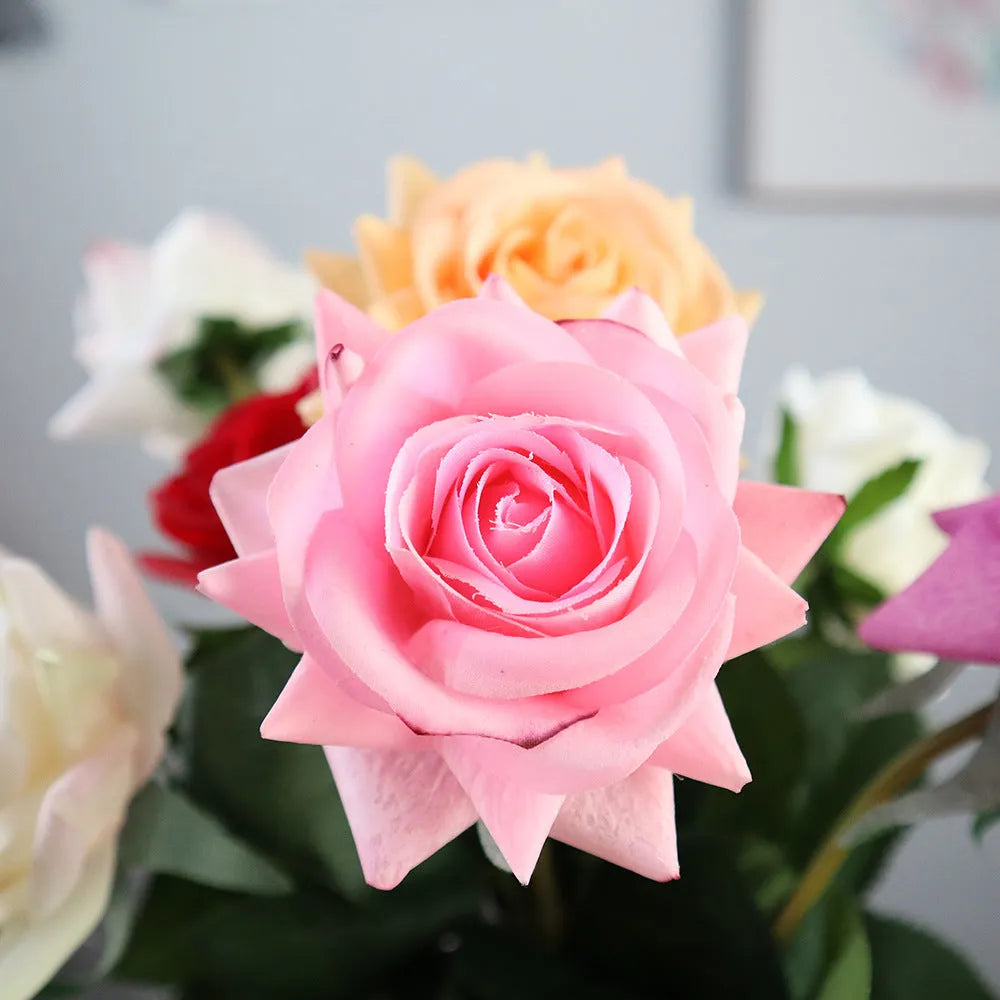 Silk artificial rose bouquet with 8.5cm flower heads in red, orange, white or purple fringe pink colours