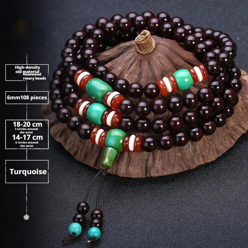 Men's rosewood 108 bead mala bracelet with a turquoise gemstone decorative centrepiece.
