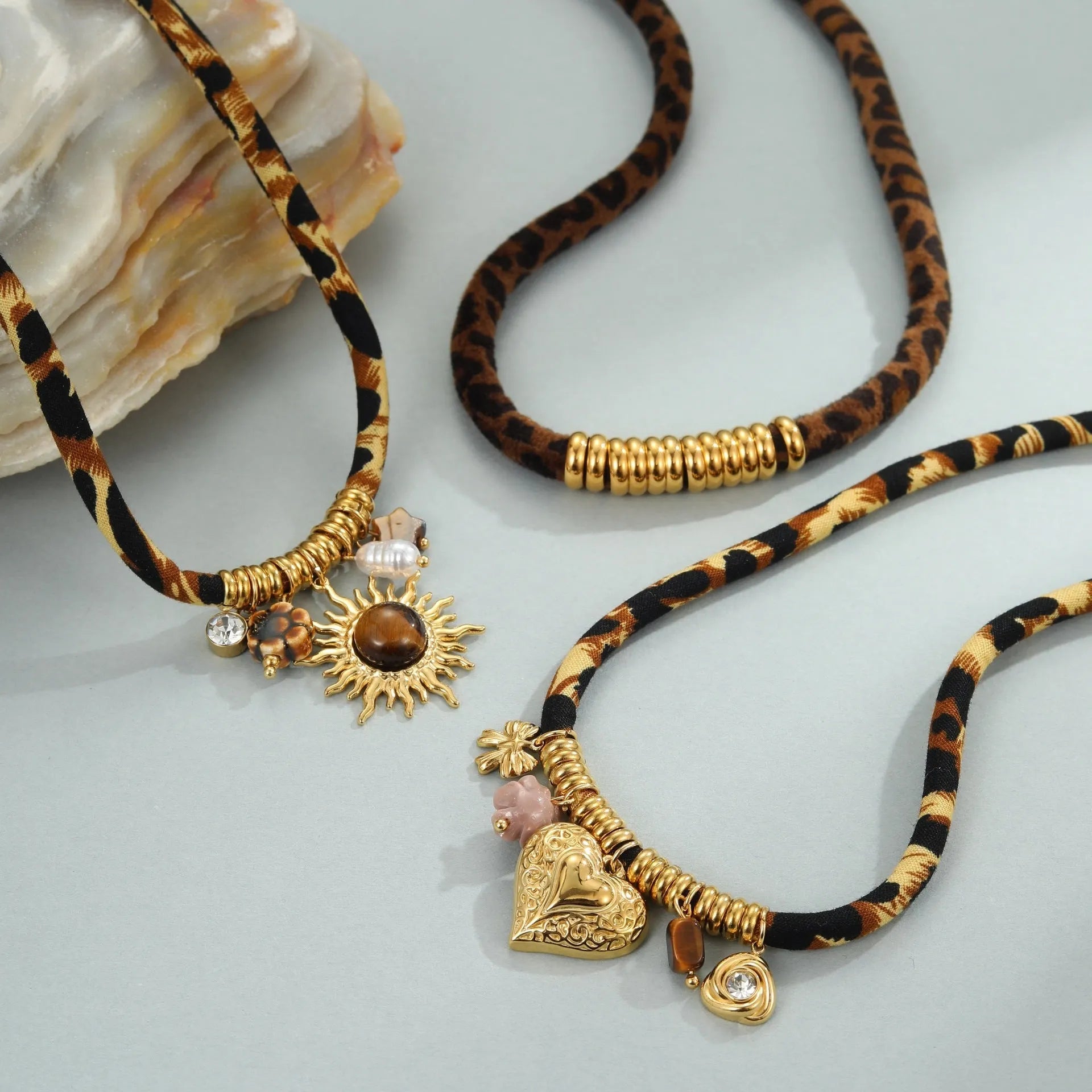 Stainless steel geometric necklace with gold electroplated finish and adjustable chain