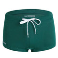 Men's white lace nylon swimming trunks with low waist boxer design for swimming and hot springs