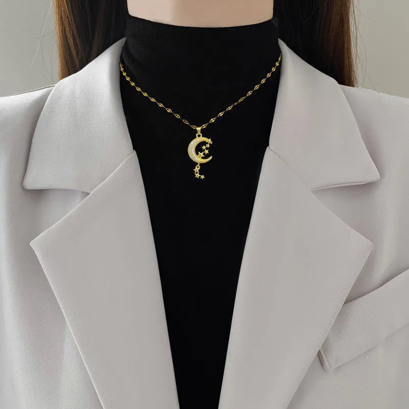 Moon pendant necklace with diamond accents on copper with geometric stainless steel chain
