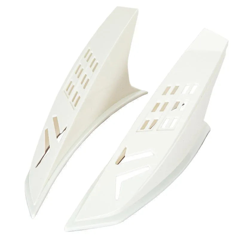 Pair of decorative plastic horns for children's helmets with adhesive backing
