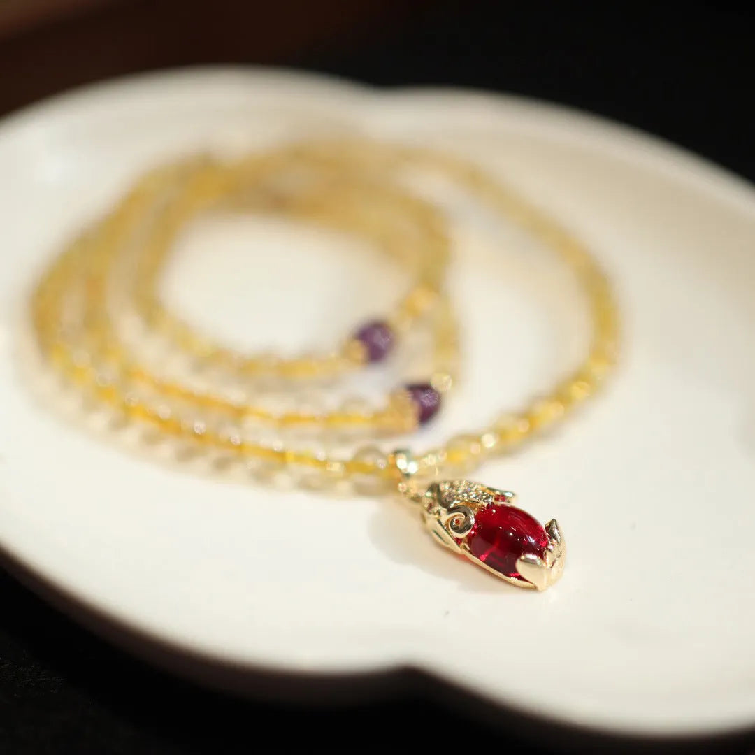 Natural Brazil gold rutilated quartz bracelet with Chinese style design and hanging chopsticks