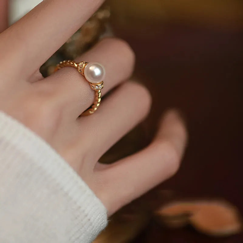 Antique geometric twist ring with pearl inlay in adjustable copper construction