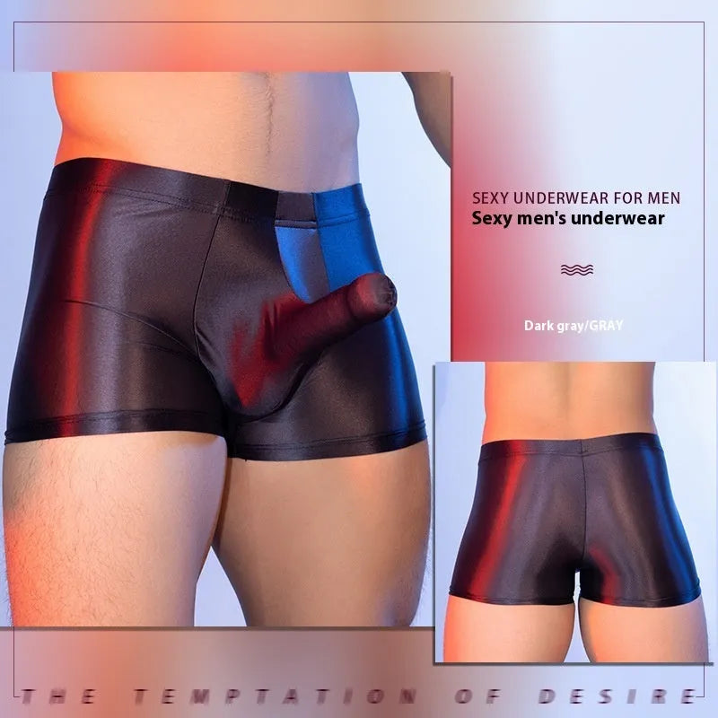 Men's red boxer shorts with a seamless nylon build and a printed elephant nose design on the front.